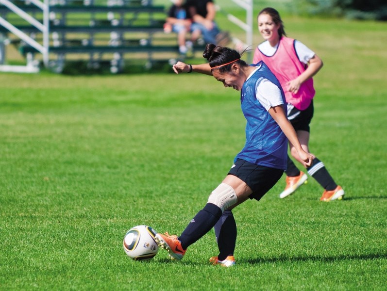 Cochrane High School Cobras Callie Morris boots the ball during Sept. 5 training at Cochrane Rangers Field. The Cobras are preparing for the Rocky View Sports Association