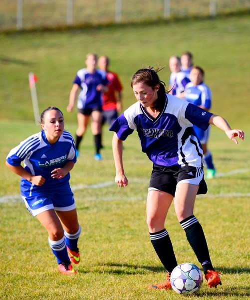 St. Timothy Thunder&#8217;s Seela Wulff controls the ball in Calgary Senior High School Athletic Association Div. 2/3 girl&#8217;s soccer play against Father Lacombe on Sept. 