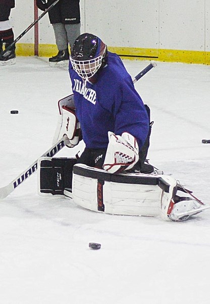 Airdrie-Cochrane (AC) Avalanche goalie Ben Laidlaw of Cochrane kicks out a puck during Avs practice Sept. 25 at Cochrane Arena. The Avs open the Alberta Minor Midget AAA