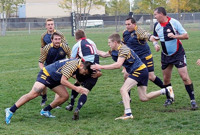 Bow Valley Grizzlies (from left) James Patterson, Mack Tivendale, Steve Sawa, Cam Birch and Lance Brown have Calgary Canucks cornered in Calgary Rugby Union Div. 3