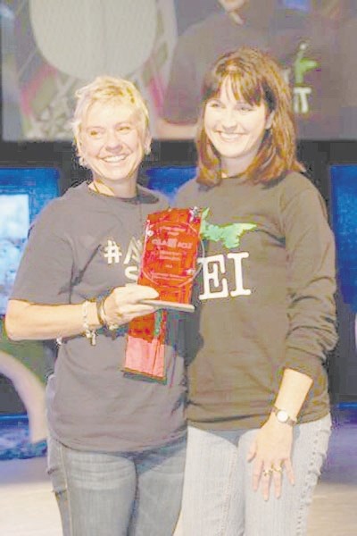 Bow Valley High School teacher Dorothy Karlson (left) was presented the Barry Sharpe Award at the 2014 Canadian Student Leadership Conference in September. The award