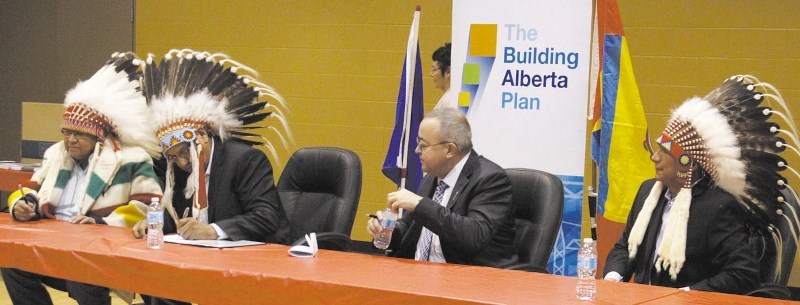 From left: Chief Ernest Wesley of the Wesley First Nation, Chief Bruce Labelle of the Chiniki First Nation, Frank Oberle, Alberta minister of aboriginal relations and Chief