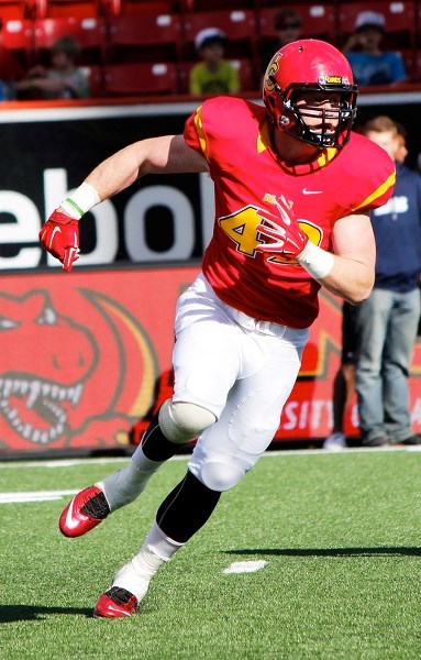 Springbank High School 2014 grad Micah Teitz is bringing his high-energy brand of linebacking to the University of Calgary Dinos.