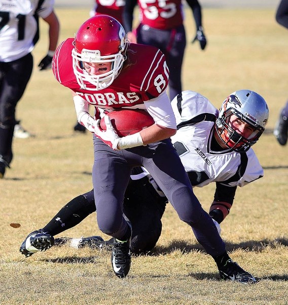 Wide receiver Spencer Marchand and the rest of the No. 3-ranked Cochrane Cobras host the No. 4-ranked Crescent Heights Vikings of Medicine Hat in an Alberta high school