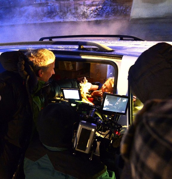 Water Valley director Eppo Eerkes, left, films a short film for Habitat for Humanity Nov. 13 under the Bow River bridge.