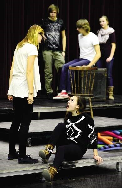 Maggie Bauder, bottom, and Kaleigh Jo Kirk rehearse for Cochrane High School&#8217;s play William Shakespeare&#8217;s Land of the Dead Nov. 25.