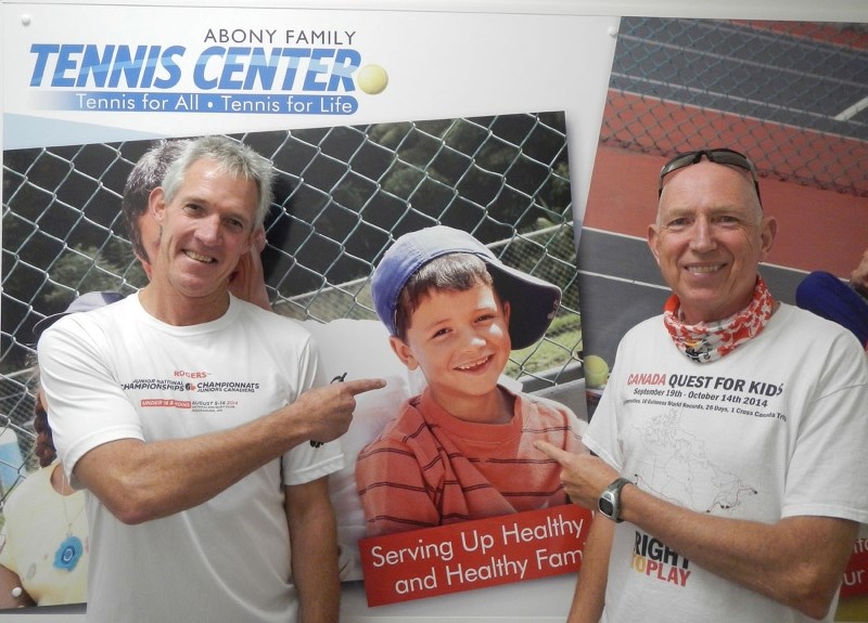 Rufus Nel, head professional for the Abony Family Tennis Centre in Fredericton, N.B. and Martin Parnell.