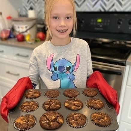 Youth show of their freshly baked Junior Chef treats. Submitted Photo