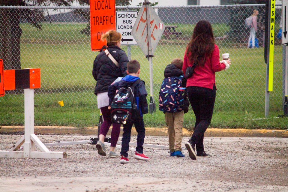 Cochrane students returned to local schools on Tuesday morning-- albeit with some added difficulties due to ongoing road work.