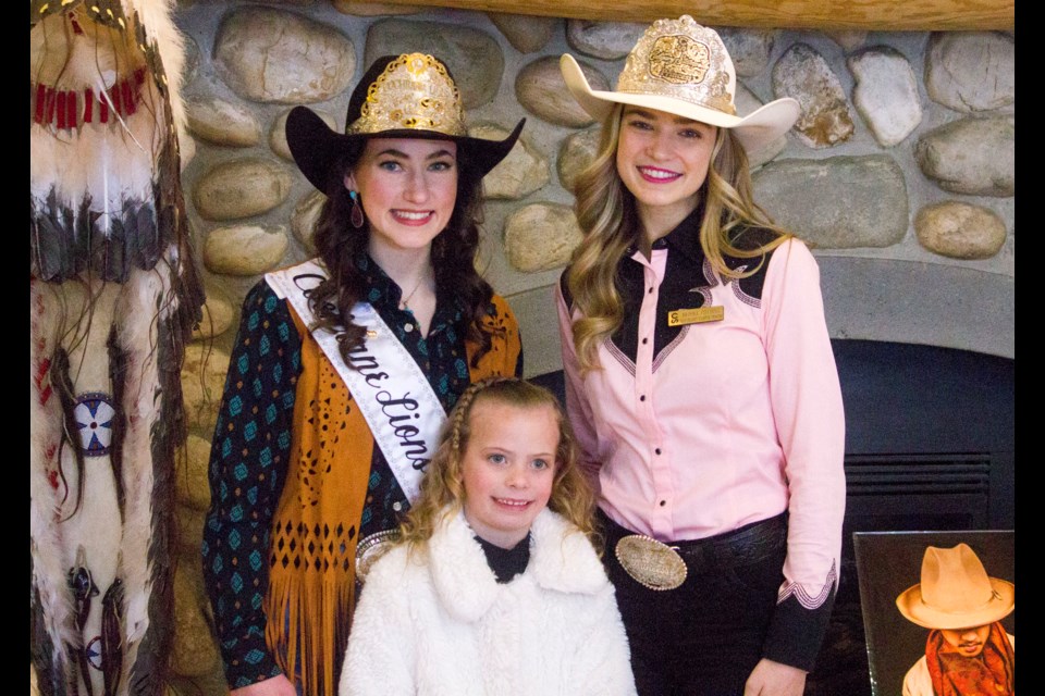 Cochrane Lions Rodeo Queen, Riley Larsen, Cochranite and Calgary Stampede Rodeo Princess, Brooke Fielding, with Maddison Hopping at the Stockmen's Memorial Foundation 2024 Bunkhouse Bonanza.