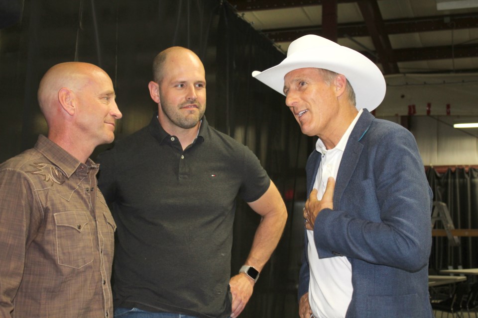 Maxime Bernier, leader of the People's Party of Canada, speaks with Mayor Jeff Genung and Coun. Pat Wilson at the Lions Event Centre on July 13. 