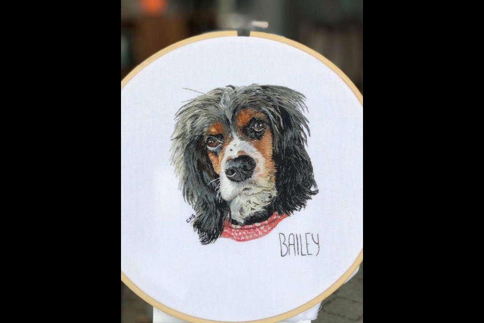One of Corrine Holliday-Scott's latest pet portrait commissions is of a spaniel named Bailey. As part of an initiative she's created to donate a minimum of $100 from each embroidery to rescues and shelters, Bailey's portrait donation went to the Cochrane and Area Humane Society. (Submitted photo)