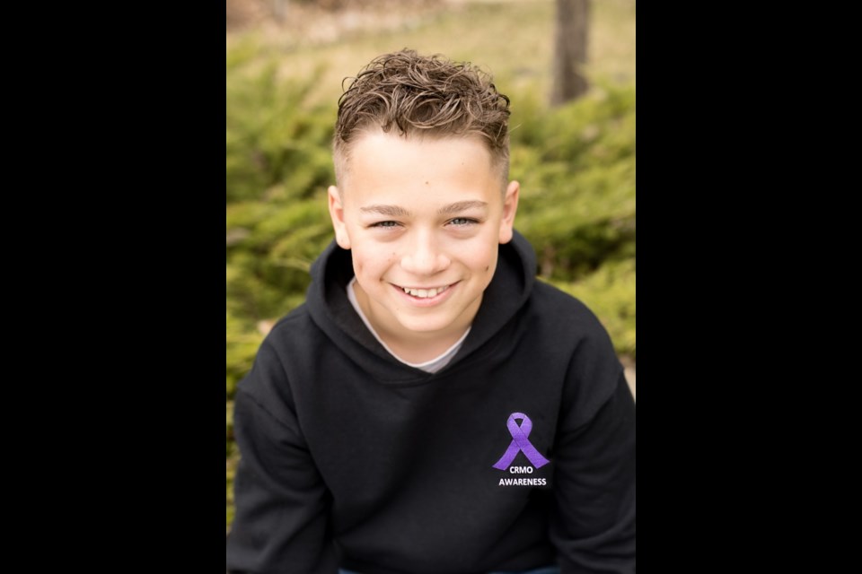 Preston Wampler, 14, and his family are raising money for chronic recurrent multifocal osteomyelitis (CRMO) research through the fund they opened at the Alberta Children's Hospital in April 2021. Wampler was diagnosed with CRMO, a rare autoimmune disease, two years ago and has since gone into remission after receiving treatments. So far, the fund has raised $34,930 of its $50,000 goal. (Photo submitted/Morgan Harrison Photography)