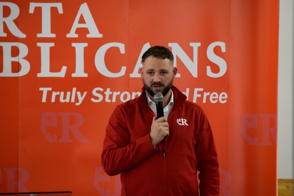 Cameron Davies, leader of the Alberta Republican Party, speaking before a crowd at the Cochrane RancheHouse on May 9. 