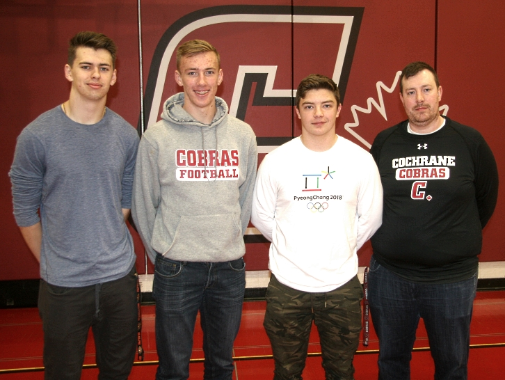 Seth Henderson poses with a group of Cochrane Cobras players after the 2018 Senior Bowl. Photo submitted.