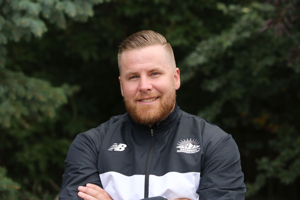Travis Cummings was named Athletics Alberta's Grassroots Coach of the Year in 2019, for his contributions to track and cross-country. (Tyler Klinkhammer/The Cochrane Eagle)