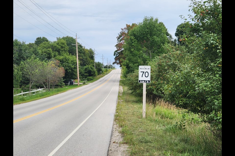 The 70 km/hr speed limit sign near Banks.