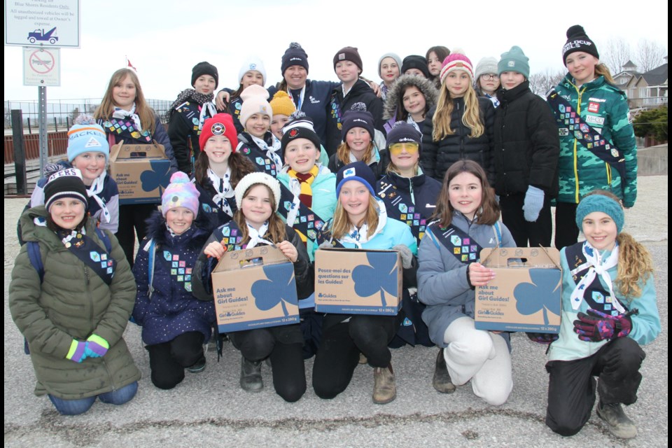 The First Collingwood Girl Guides, led by Jessica Maitland, have been selling cookies to raise funds for a spring camping trip.