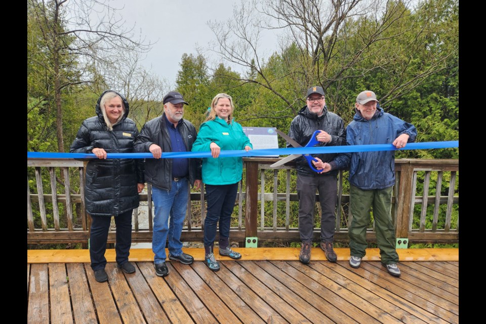From left: The Blue Mountains councillor Paul Hope, John Bittorf of the Grey Sauble Conservation Authority, Mayor Andrea Matrosovs and Beaver River Watershed Initiative members Brad Mulligan and Andy McKee.