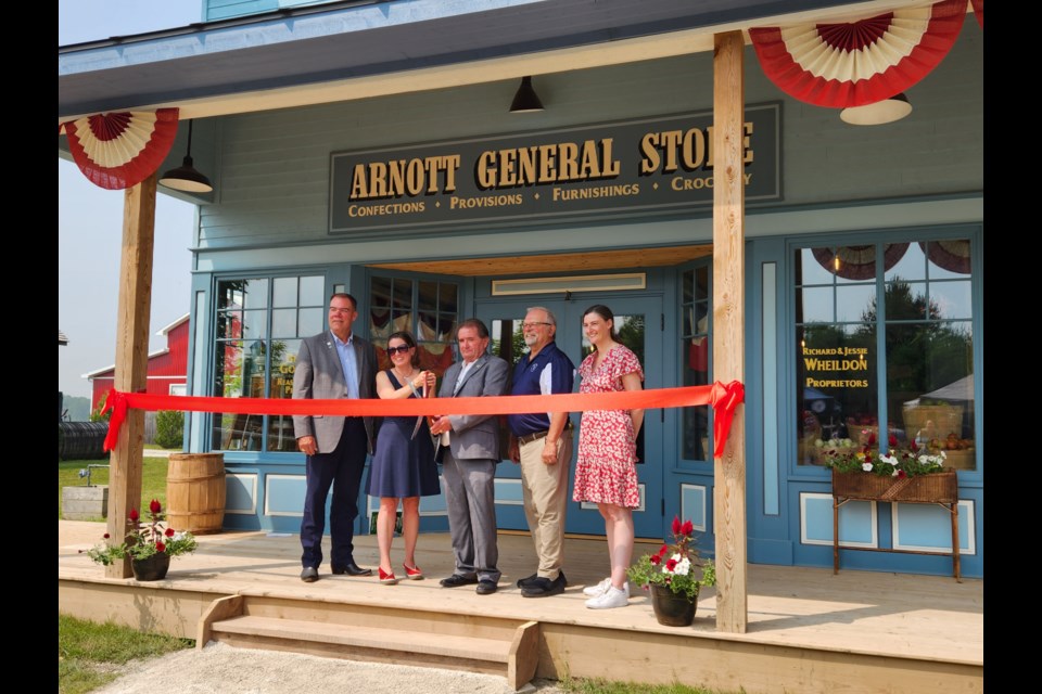 Grey Roots Museum and Archives officially opened the new Arnott General Store in Moreston Heritage Village with a recent ribbon cutting. From left: Grey County Warden Brian Milne, museum curator Sim Salata, Thomas Wheildon, Don Sankey and museum and archives manager Jill Paterson.