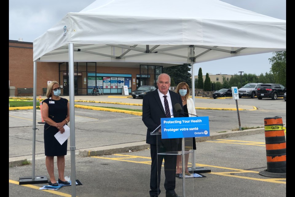 MPP Jim Wilson joins Minister Christine Elliott to announce government support for a redeveloped hospital