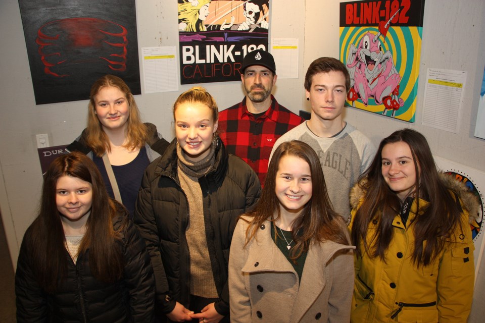 Steve Zago and his art students were at Mad Dogâs Coffee and Vinyl Cafe for an artists reception to launch the silent auction for the album art on canvas created by the class. All proceeds are being donated to the Fay Foundation. Erika Engel/CollingwoodToday