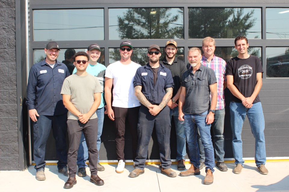 The team that built the Teck Truck includes (from left to right) Mike Booth (wiring and connections), Miemh Demetriou (controls), Greg Wagner (electrical technician), Chris Gravelle (control systems and software), Jason DeGuire, (shop lead at MEDATech), Ryan Nobes (electrical system design) Mark Seeber (hydraulics), Scott Dalrymple (project manager) and Darren Mueller (sales and marketing).