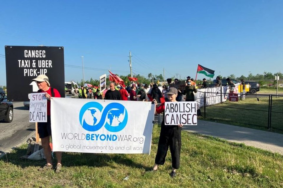 Frank McEnaney and Gillian at the CANSEC action by peace groups. 