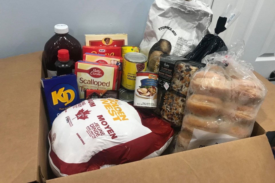 Yaniw has packed the boxes with all the fixings for a full turkey dinner. Contributed photo