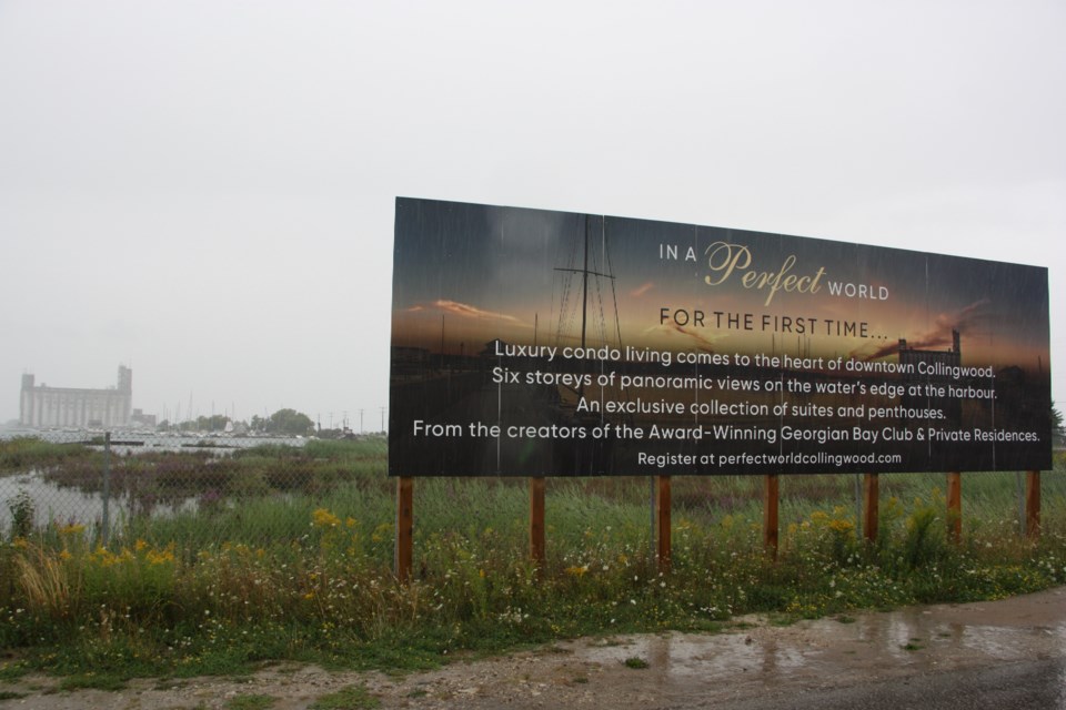 A sign marks the spot of the future Perfect World development by DunnCap, which will include three six-storey buildings containing condos, a hotel and other commercial/retail uses. Erika Engel/CollingwoodToday