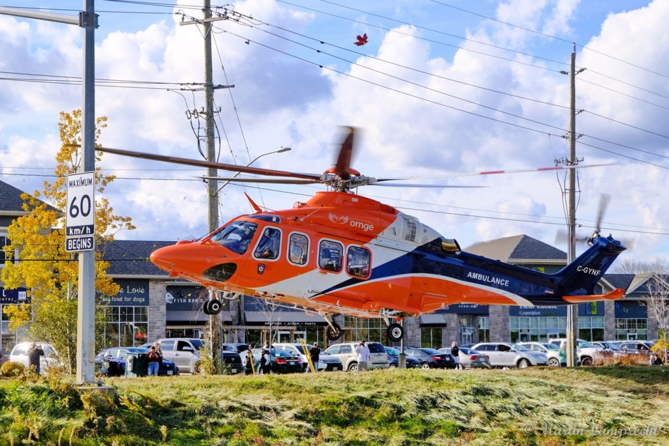 An air ambulance leaves the scene of a single-vehicle collision in Collingwood on Friday, Nov. 12. 