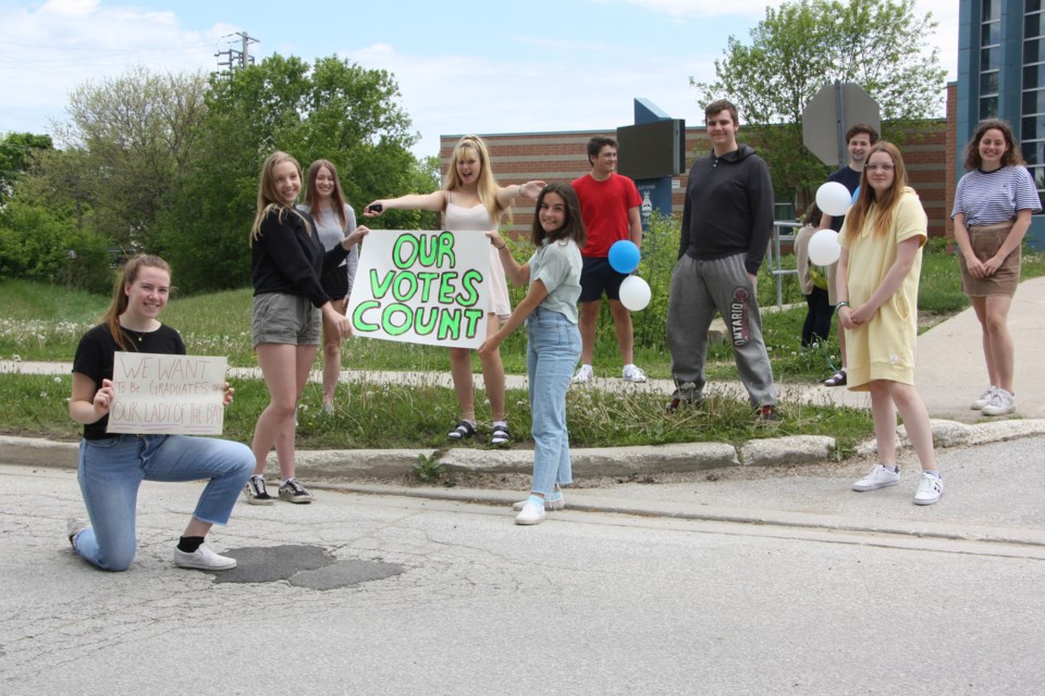 Grade 12 students have undertaken an extra project in their graduating year, which includes public demonstrations calling for the school board to approve Our Lady of the Bay as the new name for Collingwood's Catholic High School. Erika Engel/CollingwoodToday
