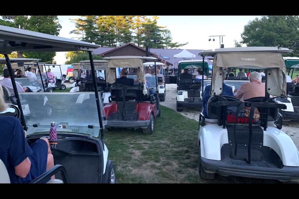 Golf carts help keep Collingwood concert goers at a safe distance
