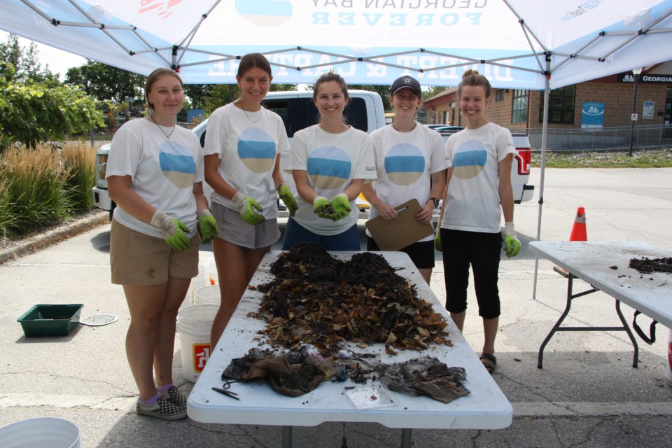 Emma Christensen, Sofie Ohrling, Nicole Dimond, Kerri Lynch, and Bronwyn Kirby, all from Georgian Bay Forever were sorting through the contents of the Collingwood Gutter Bins last week. 