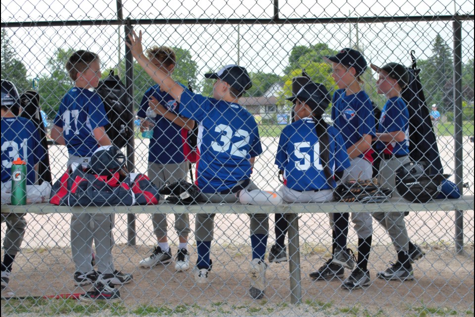 Players support each other in the dugout during one of the games. Jessica Owen/CollingwoodToday