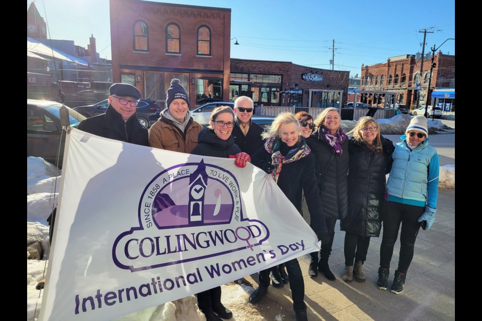 Collingwood politicians and staff from My Friend's House gathered on March 7, 2023 to raise the flag to mark International Women's Day on March 8.