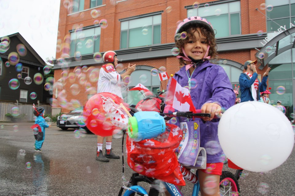 Kashius Alexander, 6, brought a bubble gun in her bike basket for the Canada Day bike parade. 