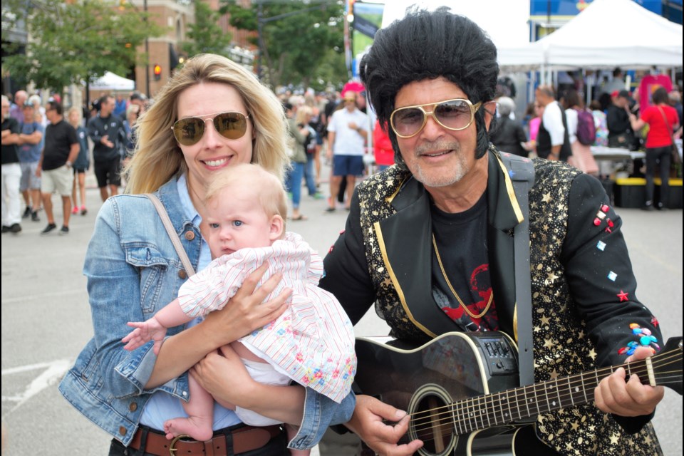 Fans both young and young at heart snuggled up to Elvis tribute artists for photos on Saturday. Jessica Owen/CollingwoodToday