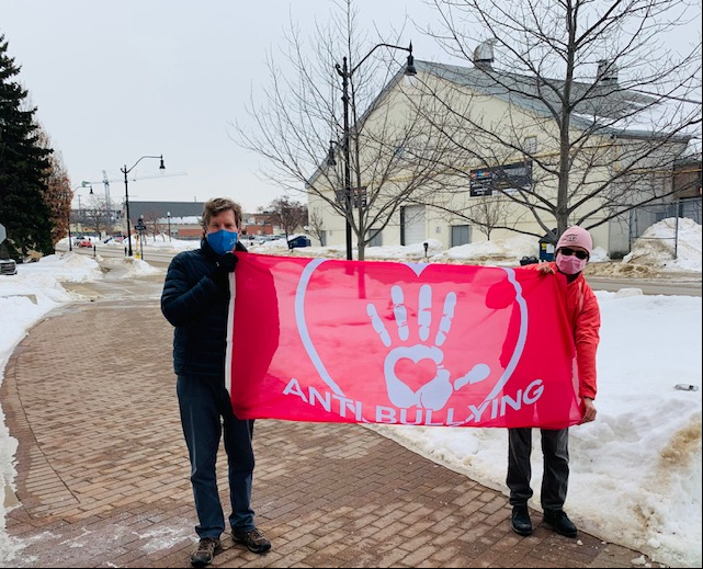Mayor Brian Saunderson and local Pink Shirt Day advocate Trevor Henson raised the anti-bullying flag today at the Collingwood Public Library. 