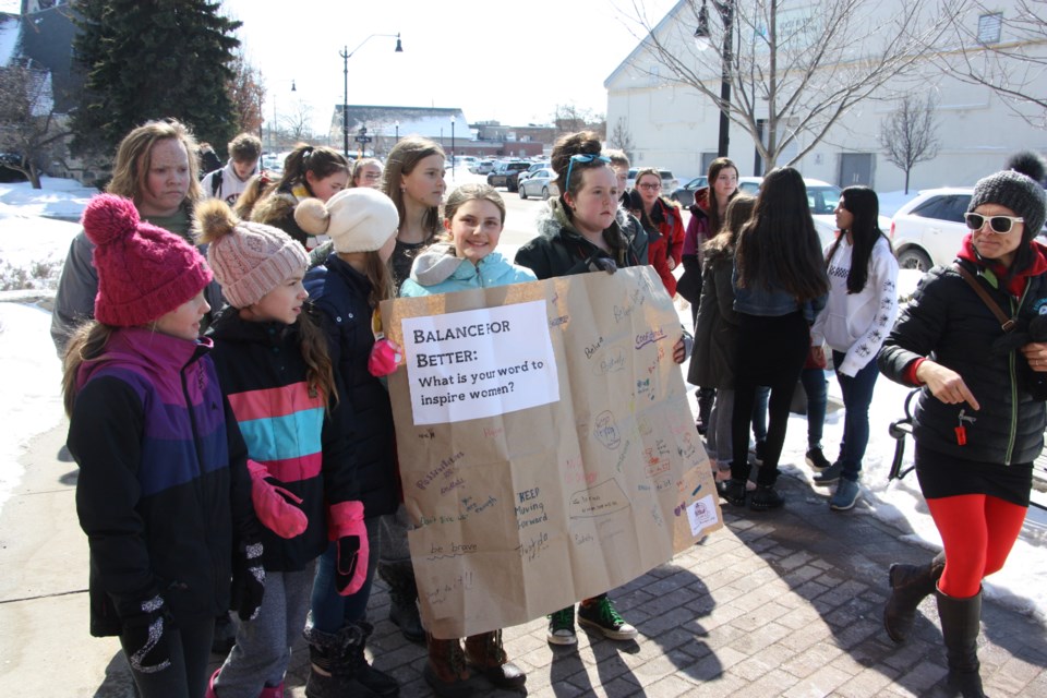 Students from St. Mary's brought a word wall they've been working on this week in honour of International Women's Day. Erika Engel/CollingwoodToday