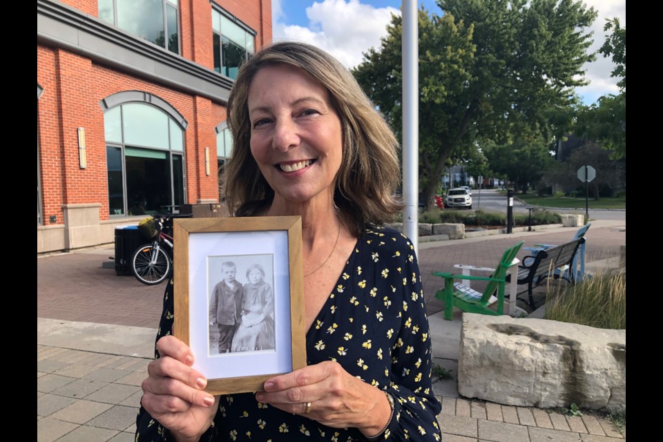Jula Walkley-Sherman shows a photo of her grandmother before she left England on a ship to Canada where she was an indentured domestic servant until she turned 18. Erika Engel/CollingwoodToday