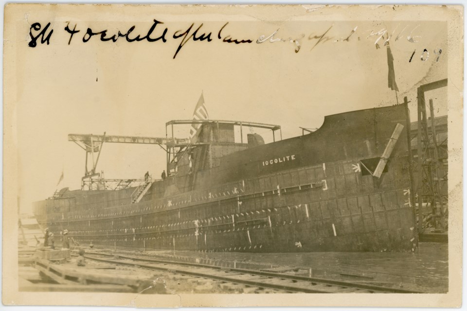 The Iocolite sits with an unpainted hull in Collingwood's harbour. It launched in April, 1916. Huron Institute 109; Collingwood Museum Collection X974.627.1

