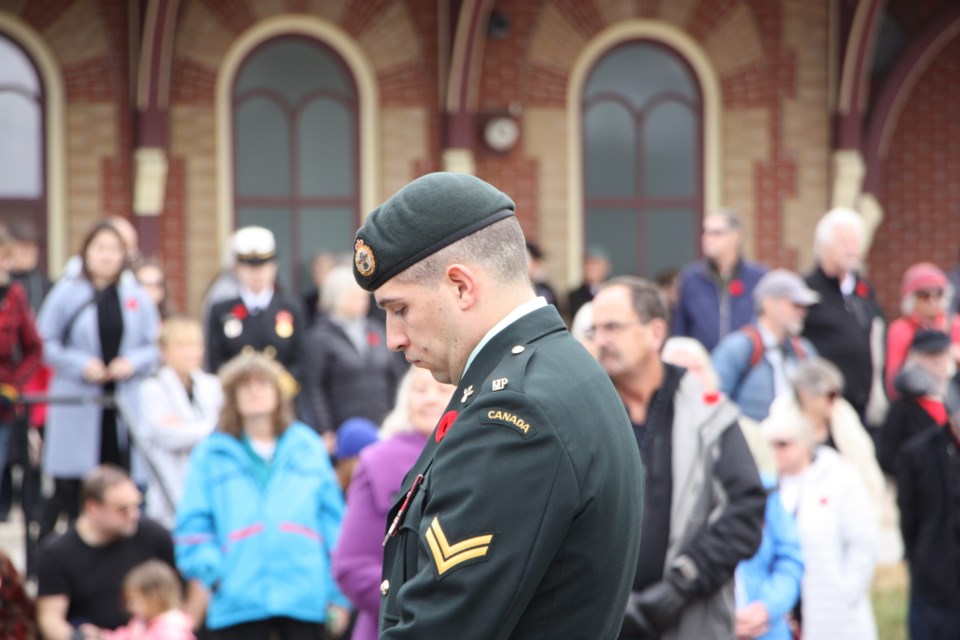 Four people stood vigil before and during the Remembrance Day ceremony in Collingwood. 