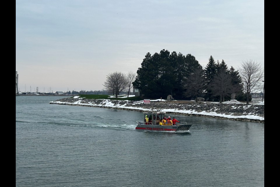 A team of four firefighters brings back six people who were stranded on Nottawasaga Island after their boat capsized, tossing one person into the water. 