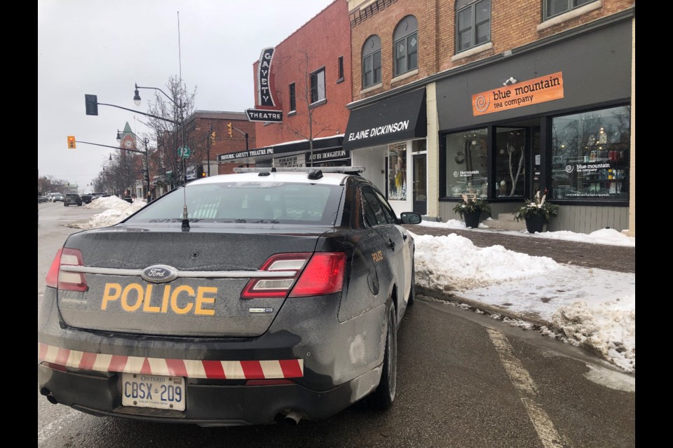 Police hold the scene downtown Collingwood for an ongoing investigation, Jan. 14, 2022.