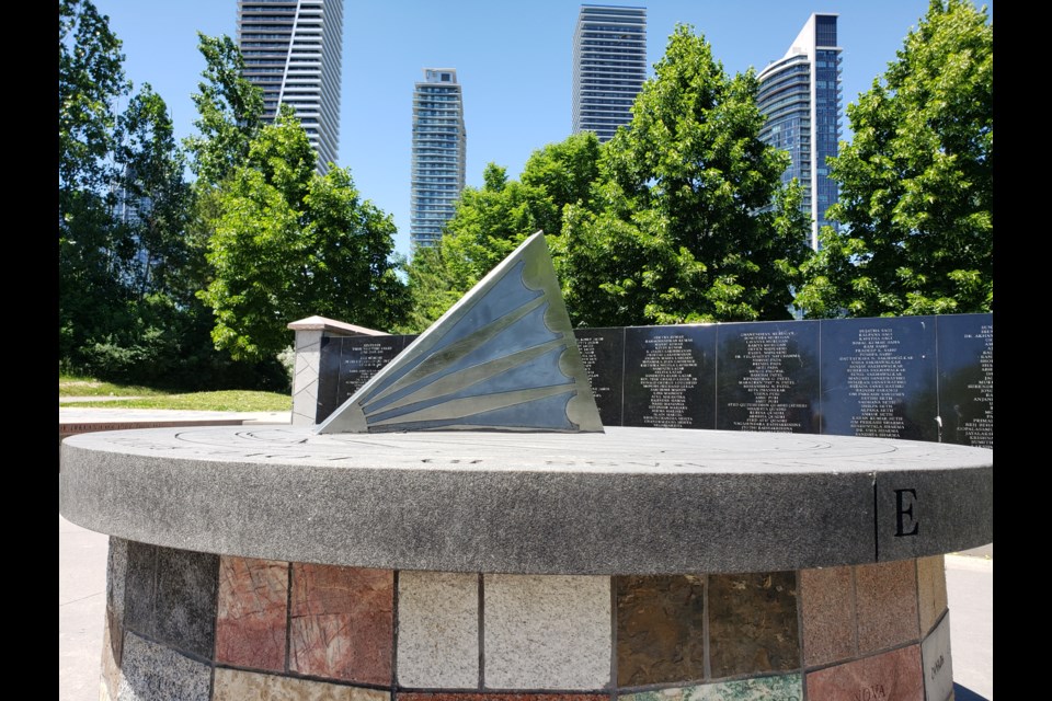 The Air India Memorial in Toronto.  The inscription around the sun dial reads: TIME FLIES / SUNS RISE AND SHADOWS FALL / LET IT PASS BY / LOVE REIGNS FOREVER OVERALL. There are also memorials in Vancouver, Montreal,  and Cork, Ireland.