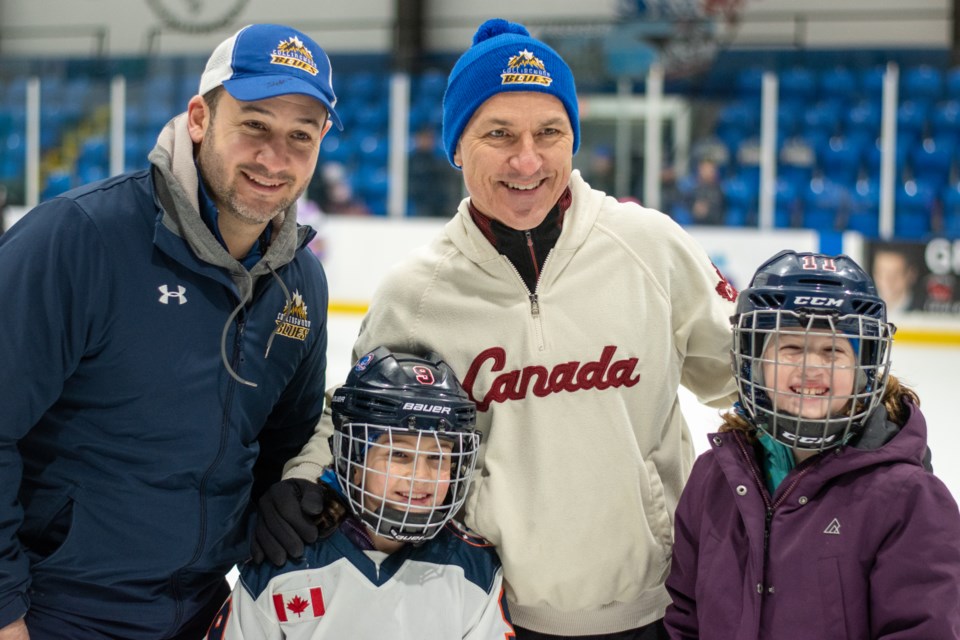Canadian figure-skating legend and Olympic medallist Elvis Stojko (middle) put on his skates and joined families and Blues players on the ice for a Family Day skate following the game. Stojko stopped for photos with the skaters. 