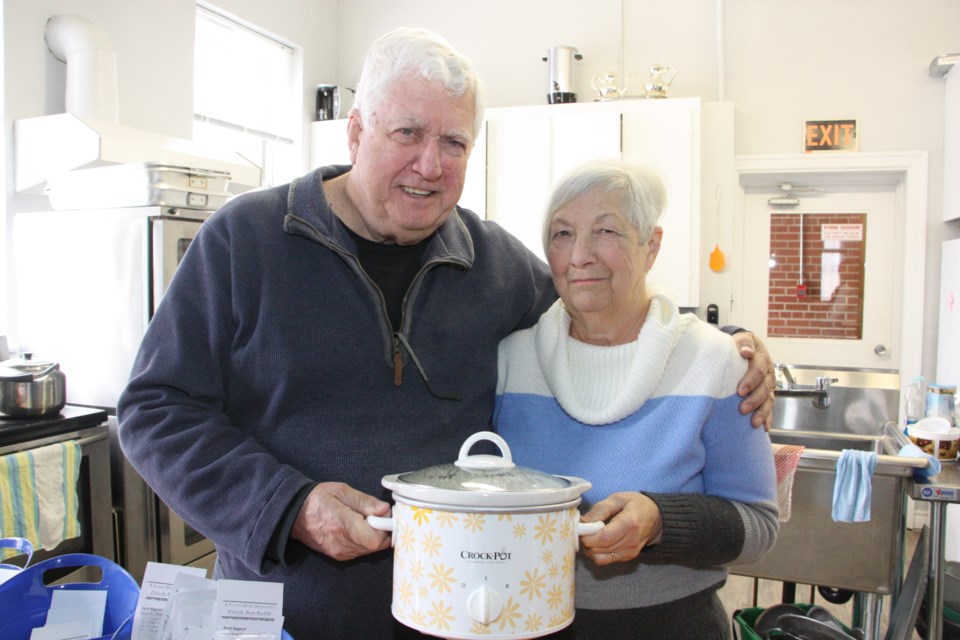 Ralph and Barb Sneyd helped create the Susan Wells Crock Pot program at Trinity United Church to help those living in rooms without access to a kitchen learn to cook for themselves. 