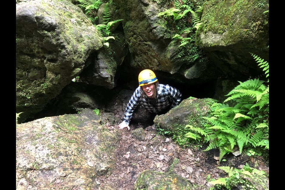 Caving involves a lot of squeezing,  as you move from room to room and go deeper underneath the cliffs above. Maddie Johnson for CollingwoodToday