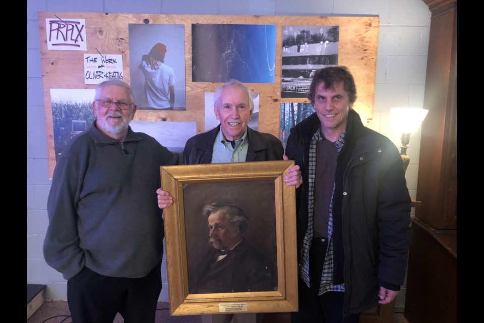 John Hethrington shows a painting of his great-grandfather, Matthe Kendall Richardson, who was the Member of Parliament for Grey South from 1899 to 1904